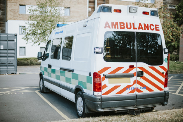 British ambulance parked in a parking lot